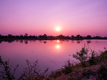 Beautiful landscape sunset at the river in the evening.の写真素材