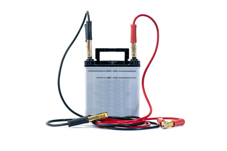 Cars battery with battery jumper isolated on white background.の写真素材