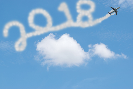 2018 figures news year drawing by airplane in the sky.の写真素材