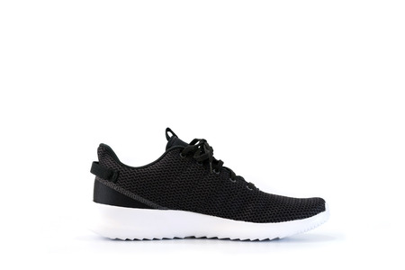 Black sneakers running shoes isolated on white background.の写真素材