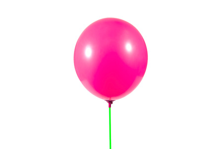 Pink color balloon isolated on white background, used for decoration at ceremonies or important events.の写真素材