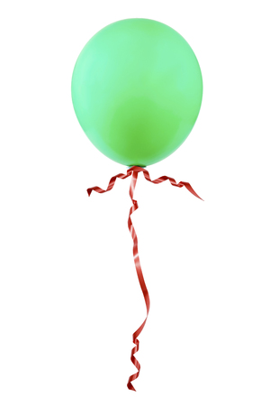 Green balloon with red ribbon isolated on white background.の写真素材