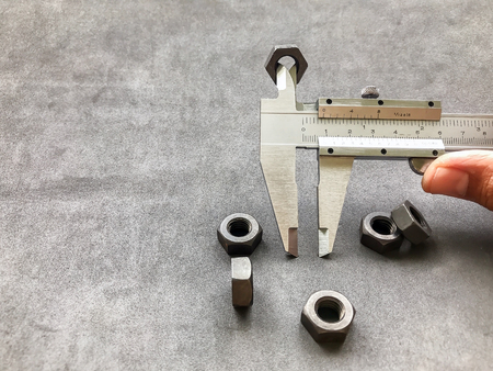 Vernier caliper is an indispensable tool in industrial applications for measuring the length, thickness, and depth of work pieces with precision.の写真素材