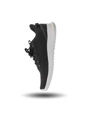 Black running shoe isolated on white background.の写真素材
