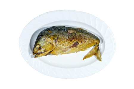 Cooked mackerel in the plate isolated on white background, with clipping path.の写真素材