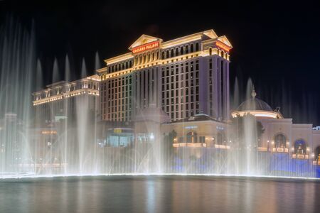 Las Vegas, Nevada/United states Of America-April 9,2018: Fountain dance show in front of the Caesar Palace Las Vegas hotel and casino at night on Las Vegas Blvd s in Las Vegas city.のeditorial素材