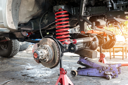 The front wheel of the car was removed to repair the brake system, Automotive industry and garage concepts.の写真素材