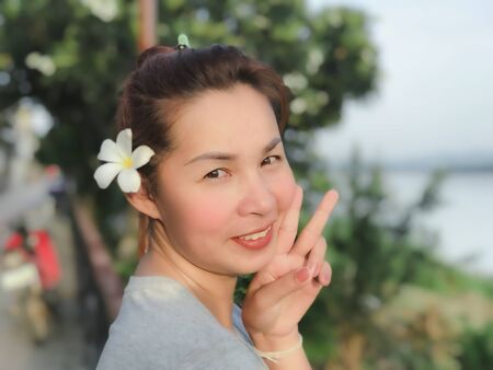 Closeup of the face of a beautiful Asian woman.の写真素材
