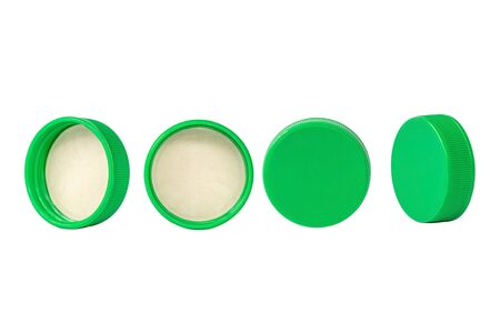 Green plastic bottle cap isolated on white background.の写真素材