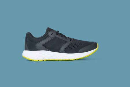 Fashion running sneaker shoes isolated on beautiful pastel color background, with clipping path.の写真素材