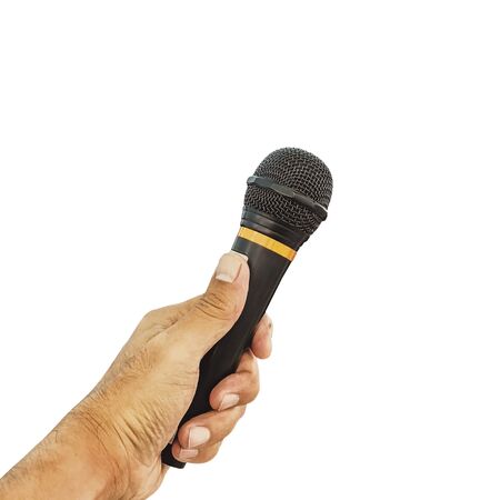holding wireless microphone isolated on white background, with  .の写真素材