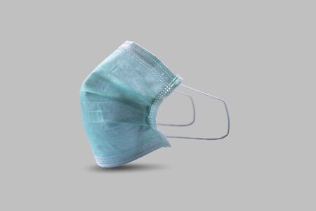 Sanitary napkin mask for preventing spreading and respiratory infections isolated on gray background, Stop Coronavirus Covid-19 concept.の写真素材