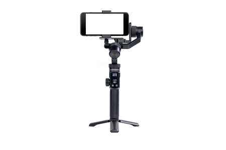 Mobile phone is mounted on a 3-axis motor stabilizer for smooth video recording isolated on white background.の写真素材