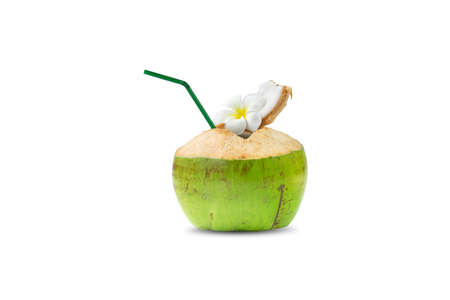 Fragrant coconut with holes inserted into a tube for drinking water inside of the coconut, on white background.の写真素材