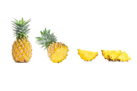 Collection of sliced pineapples and pineapple isolated on white backgroundの写真素材