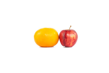 Oranges or tangerine and apple isolated on white backgroundの写真素材