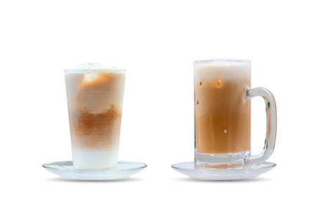 Iced coffee with ice in a glass isolated on white color background.の写真素材