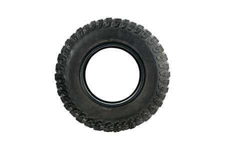 All terrain tire designed for use in all road conditions isolated on white background.