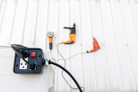 Close-up of black trailer plug 2 sockets with on-off switch for use with hand tools.の写真素材