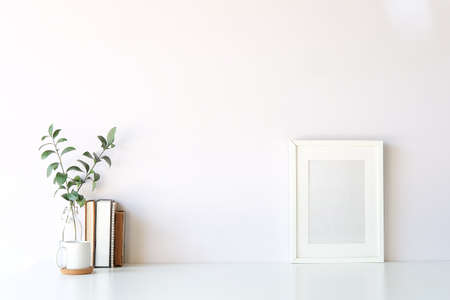 Mockup workspace desk and copy space books,plant and coffee on white desk.の写真素材