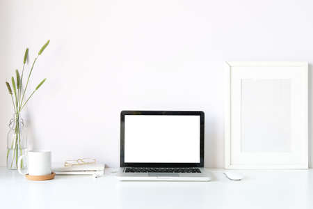 Workspace desk and laptop. copy space and blank screen. Business image, Blank screen laptop and supplies.の写真素材