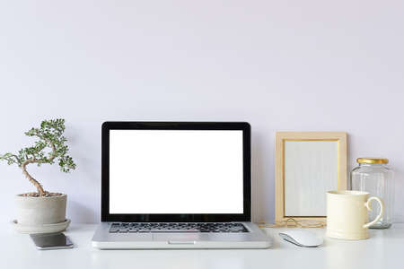 Workspace desk and laptop. copy space and blank screen. Business image, Blank screen laptop and supplies.の写真素材