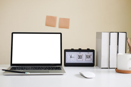 Mock up Copy Space Blank Screen workspace with computer laptop on table.の写真素材