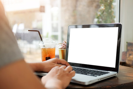 Mock up Copy Space Blank Screen workspace with computer laptop on table.の写真素材
