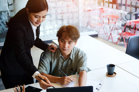 Business people in the office are planning a strategy for the future of the business.の写真素材