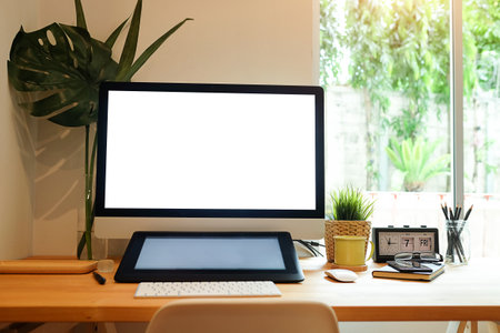 Mock up Copy Space Blank Screen workspace with computer laptop on table.の写真素材
