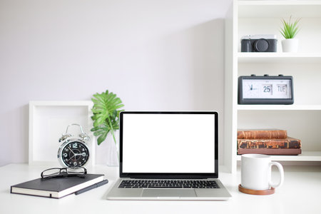Workspace desk and laptop. copy space and blank screen. Business image, Blank screen laptop and supplies.の写真素材
