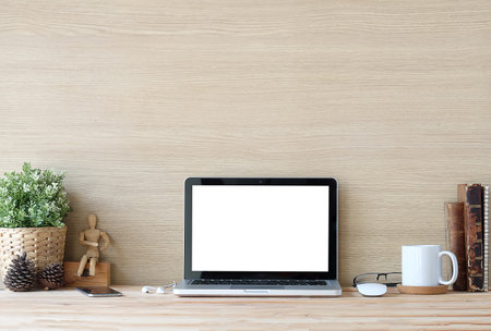 Workspace desk and mockup laptop. copy space and blank screen. Business image, Blank screen laptop and supplies.の写真素材