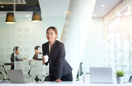 Portrait businesswoman using laptop for work on work space.の写真素材