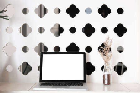 Modern workspace with computer with blank screen and equipment on white table.Blank screen for your information.の写真素材