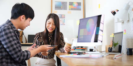 Team of professional designers working with new startup project in modern office.の写真素材