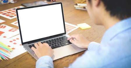 Businessman working with computer in modern office.の写真素材