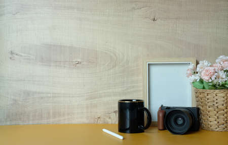 Mockup workspace desk and copy space book,plant and coffee on wood desk.の写真素材