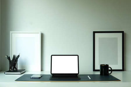 Modern workspace with computer with blank screen and equipment on white table.Blank screen for your information.の写真素材