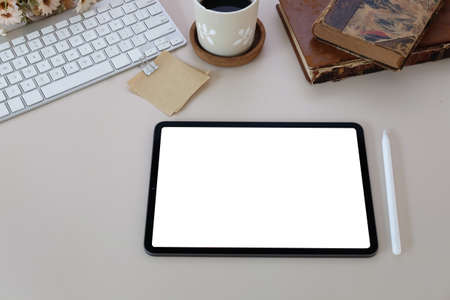 Top view office stuff with notepad, laptop and coffee cup mouse notepad shot.blank screen mobile...