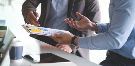 Business working in office with documents and laptop people Consulting and business planning.