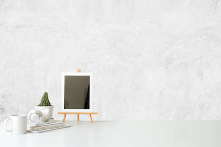 Mockup workspace desk and copy space book,plant and coffee on wood desk.の写真素材