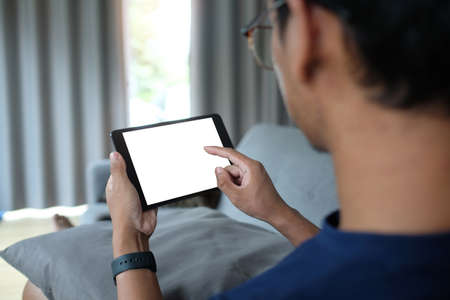 Businesspeople using digital tablet and working together on new their project at meeting room.の写真素材