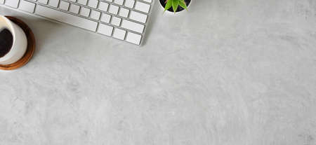 Top view office stuff with notepad, laptop and coffee cup mouse notepad shot.blank screen mobile...