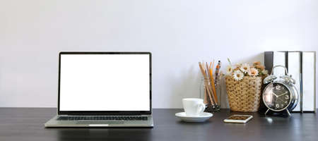 Workspace desk and laptop.Business image, Blank screen laptop and supplies.
