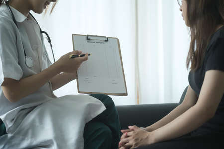 Psychiatrist consulting patient with health disease or mental illness in medical clinic.の写真素材