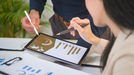 Group of business people are meeting to analyzing data for marketing plan at office.の写真素材