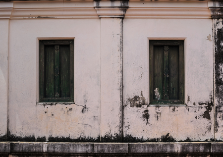 Ancient window and wall of Phi Man Phet Ma Ha Suan Hall,Phra Nakhon Khiri Historical Park, Phetchaburi Province,Thailand.の写真素材