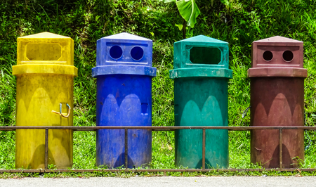 Trash recycling container, rubbish bin row in the park.の写真素材