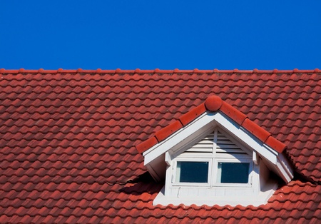 Red Roof on blue skyの写真素材