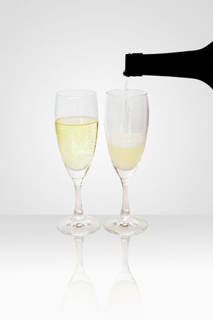 Refilling a glass of Champagne, Sparking Wineの写真素材